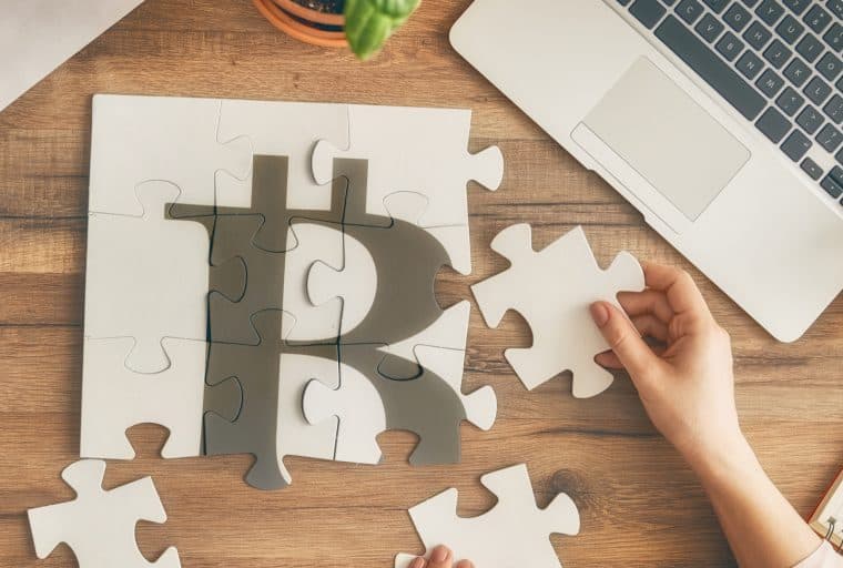 This Week in Bitcoin: McAfee Backs Off, Crypto World Cup and the Mystery of 21e8