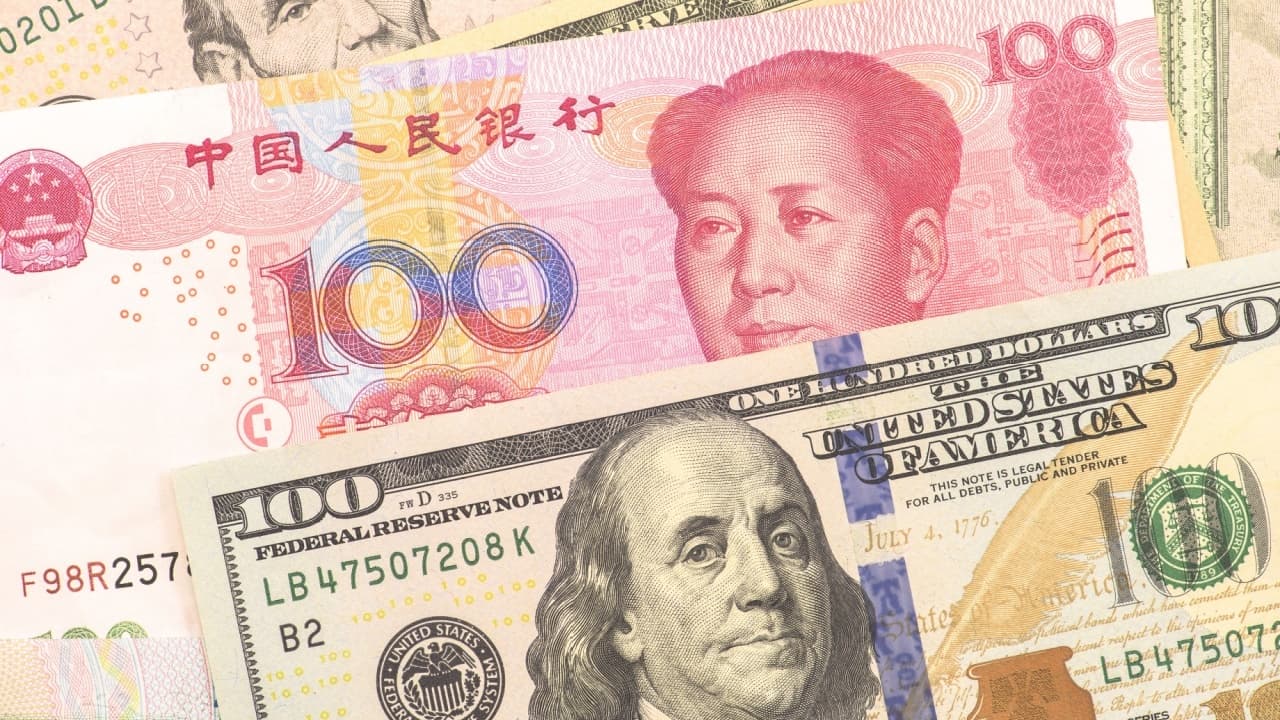 China Asks Banks to Curb Dollar Purchases as Yuan Hits Multi-Year Low
