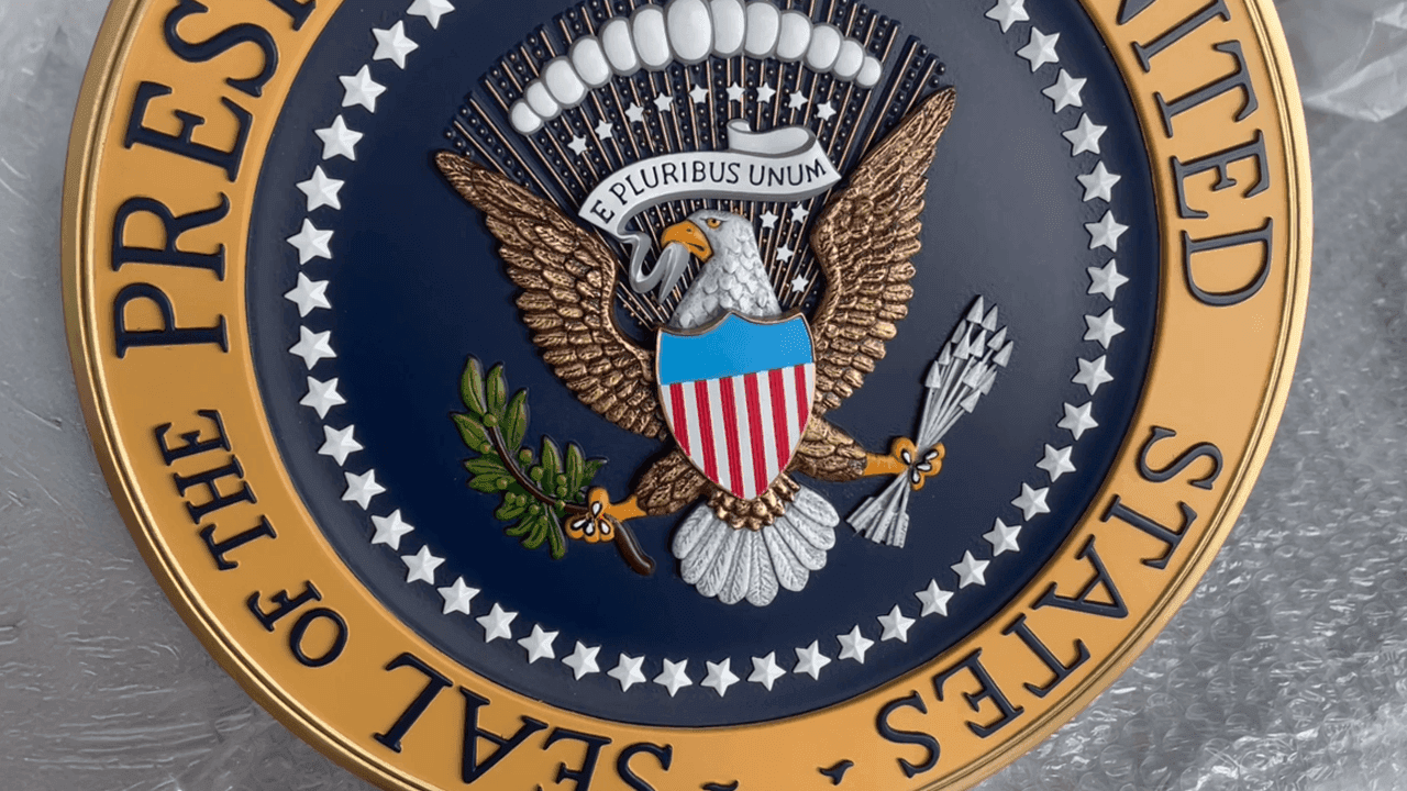 Presidential Seal Controversy Hits TRUMP Memecoin Holder Event