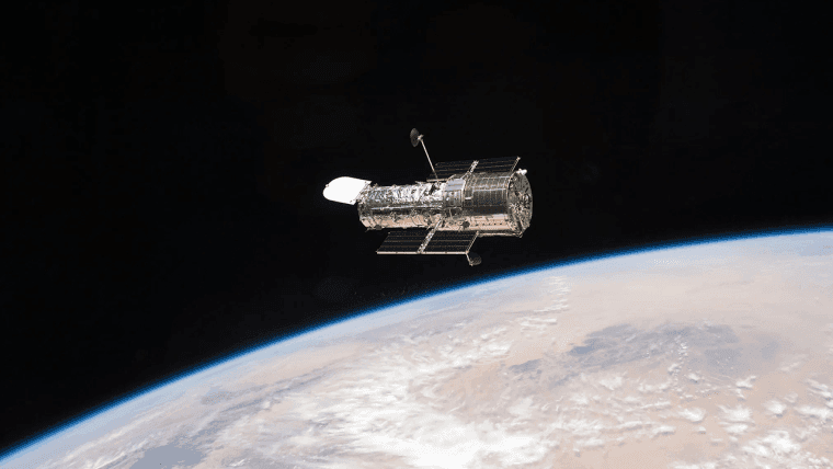 A Figure-Eight in Deep Space: Hubble Image Shows Gravity Warping Distant Galaxies