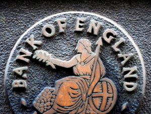 A plaque depicting Britannia is seen on the outside of the Bank of England in the City of London February 4, 2010. Britain's Bank of England put a hold on its unprecedented 200 billion pound asset-buying programme for the first time in 11 months on Thursday, but left the door open for more so-called quantitative easing if the economy relapsed. REUTERS/Toby Melville (BRITAIN - Tags: BUSINESS) - RTR29TSM
