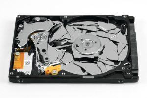 stock-photo-12632606-broken-hard-disk-drive